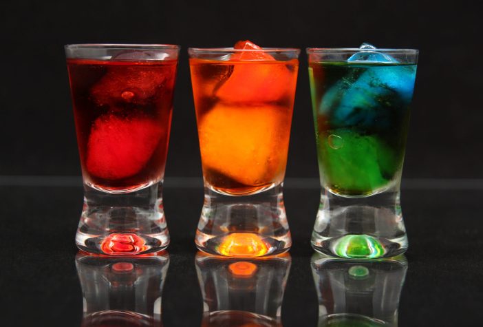 Colorful shots on a dark background.
