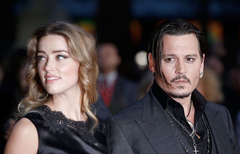 Amber Heard and Johnny Depp attend the "Black Mass" Virgin Atlantic Gala screening