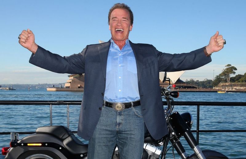 Arnold Schwarzenegger, wearing a suit jacket and jeans, at the Terminator:Genisys Sydney, Australia