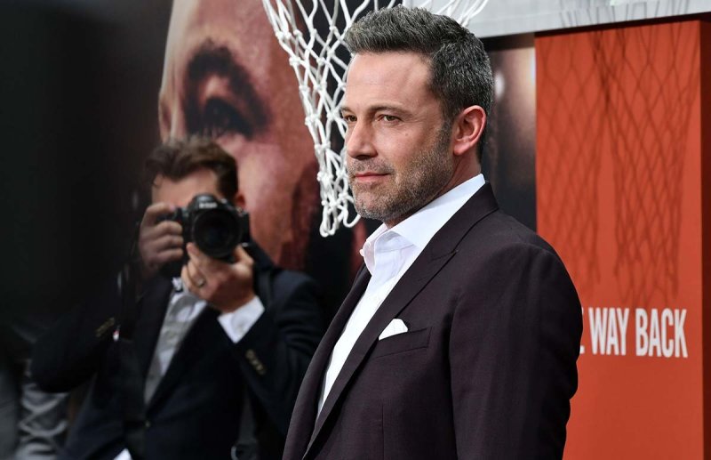Ben Affleck in front of a basketball hoop at the premiere of The Way Back