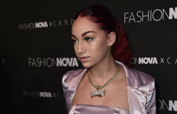 Bhad Bhabie (Danielle Bergoli) In a pink tube top and midriff jacket on the red carpet.