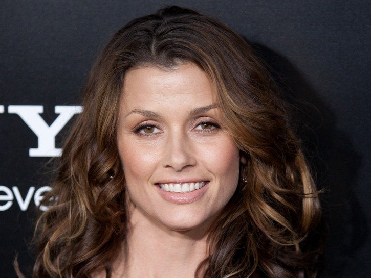 Bridget Moynahan wearing a black dress on the red carpet