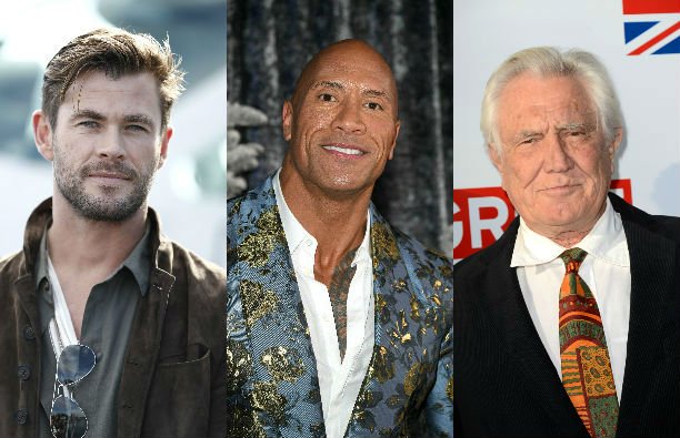 Chris Hemsworth in a brown jacket, Dwayne Johnson in a blue embroidered suit on the red carpet, Geor