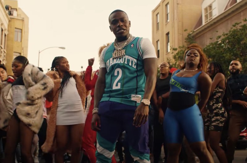 DaBaby rapping in his music video for BOP on Broadway