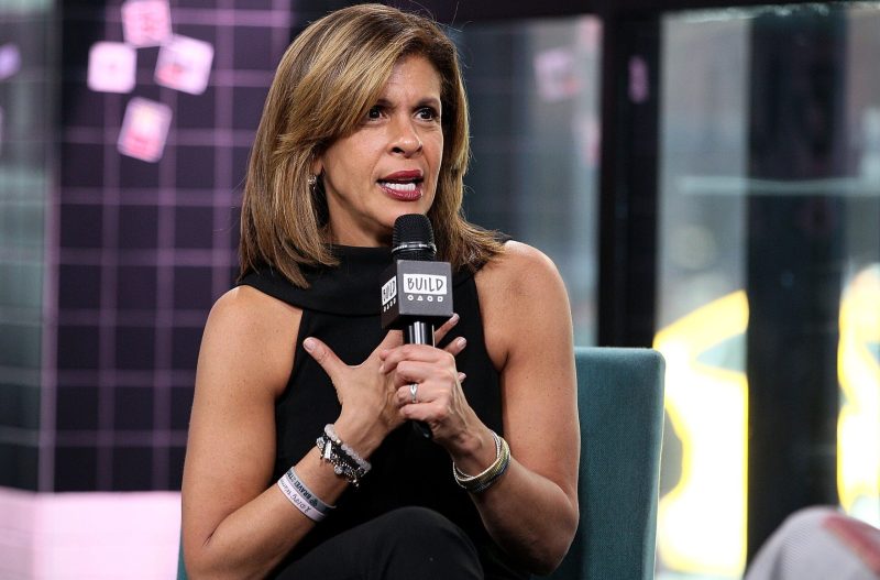Hoda Kotb looking confused, holding a microphone.