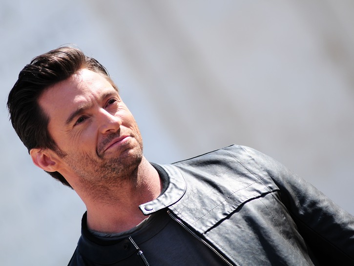 Hugh Jackman wearing a plain black t-shirt under a leather jacket to screen X-Men Origins: Wolverine