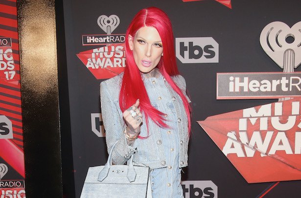 Jeffree Star in a denim jacket and skirt combo attends the iHeartRadio Music Awards 2017