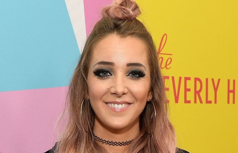 Jenna Marbles on the red carpet with slightly pink hair