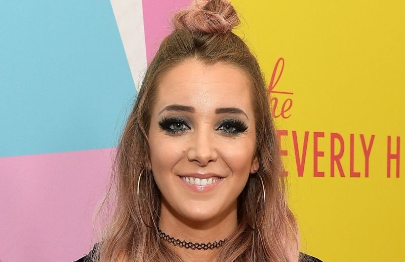 Jenna Marbles on the red carpet with slightly pink hair