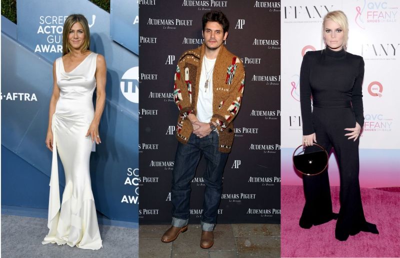 Jennifer Aniston wearing a white dress on the red carpet. John Mayer wearing a brown jacket, white s