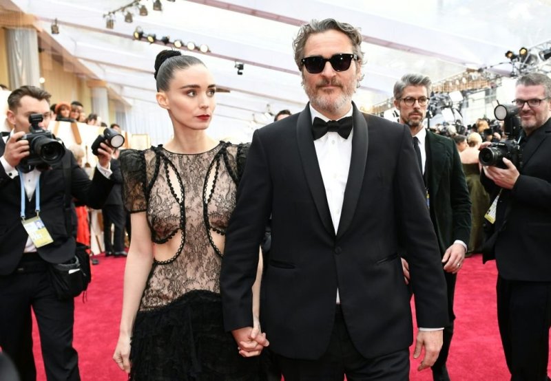 Joaquin Phoenix arrives with Rooney Mara for the 92nd Oscars at the Dolby Theatre in Hollywood