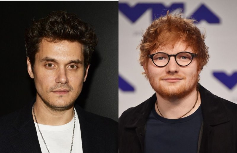 John Mayer wearing a black jacket over a white t-shirt on the red carpet. Ed Sheeran wearing a black