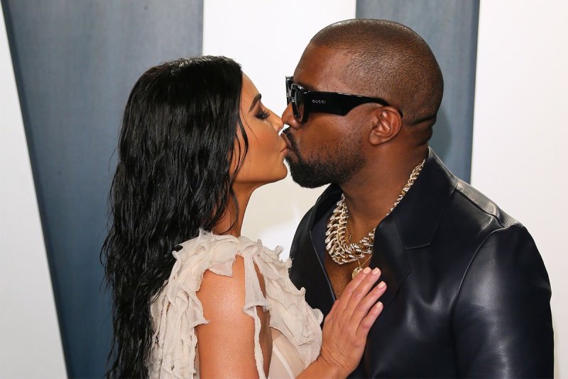 Kanye West kissing Kim Kardashian