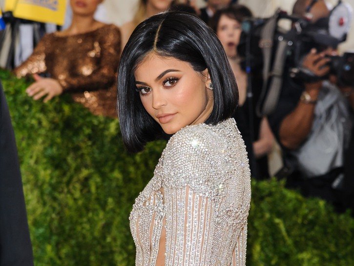 Kylie Jenner wearing a bedazzled gown on the red carpet at the Met Gala in 2016