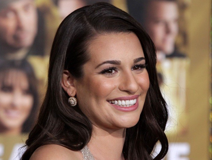 Lea Michele wearing a sparkling silver dress to the premiere of New Year's Eve