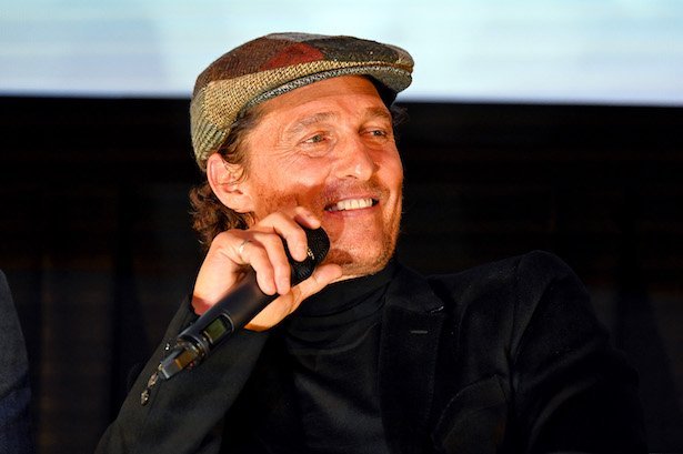 Matthew McConaughey in a black suit and newsboy cap at an Alamo Screen of The Gentlemen