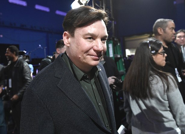 Mike Myers in a black jacket and green shirt at the 91st Oscars