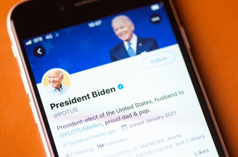 Photo of a cell phone with @POTUS opened up in the Twitter app.