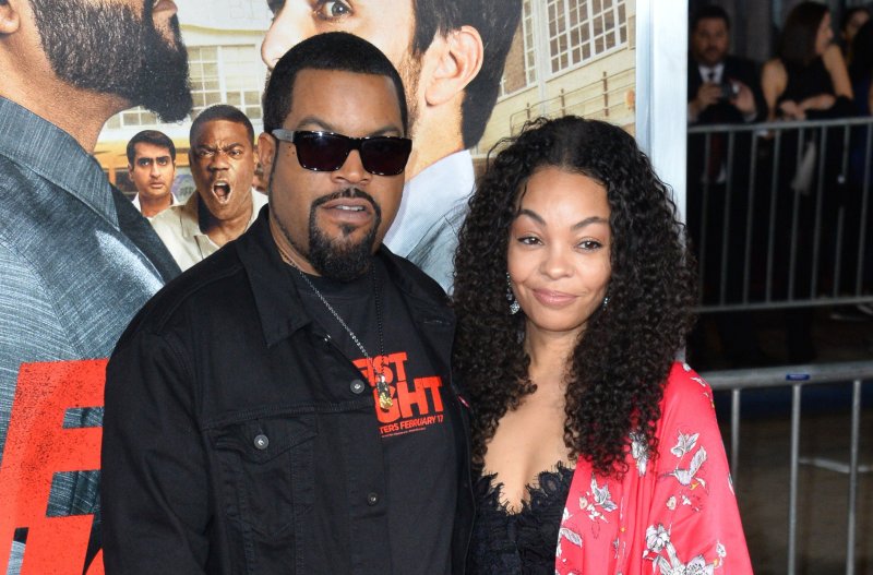 Rapper Ice Cube and wife Kimberly Woodruff on red carpet at "Fist Fight" premiere in 2017