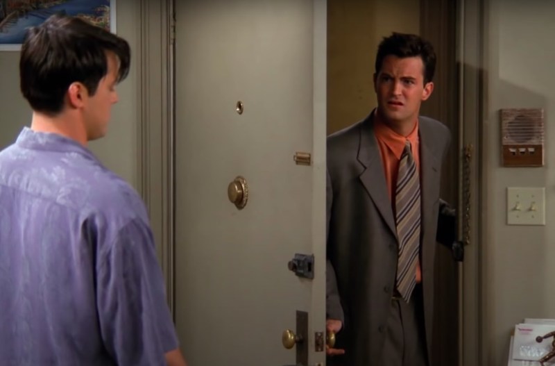 Screenshot from Friends of Matthew Perry as Chandler Bing in a suit