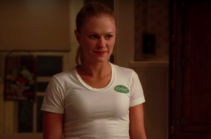 Screenshot of True Blood of Anna Paquin looking to the side in a white shirt