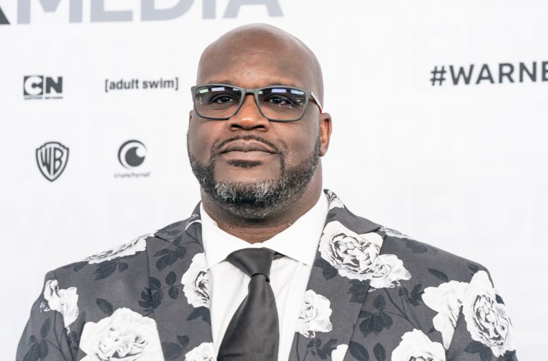 Shaq wearing floral suit and glasses in 2019