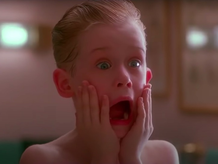 still from Home Alone of Macaulay Culkin screaming with his hands on his face