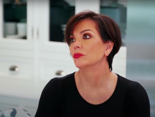 still from Keeping Up with the Kardashians of Kris Jenner in a black shirt