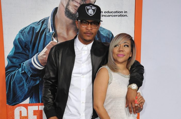 T.I., wearing a black jacket, stands with Tameka "Tiny" Harris at the premiere of Get Hard