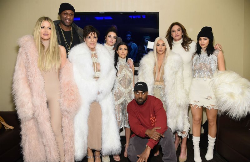 The Kardashian/Jenner family in various shades of white and pink at Kanye West's Season 3 Yeezy show