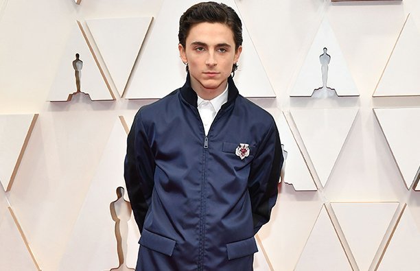 Timothée Chalamet in a tracksuit on the red carpet at the Oscars