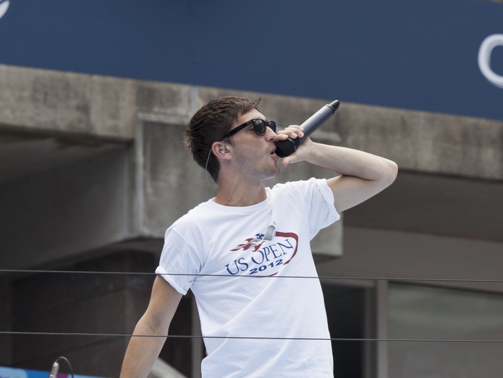 Tom Parker of The Wanted singing