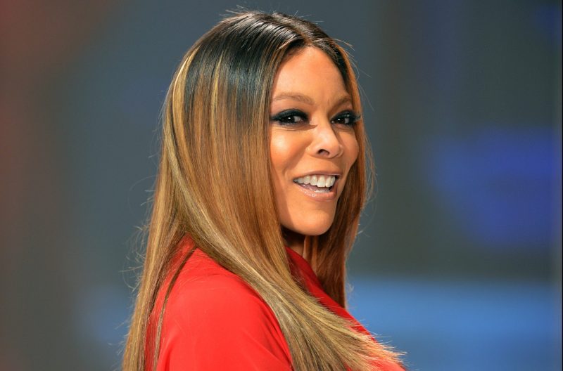 Wendy Williams walks the catwalk in a bright red dress