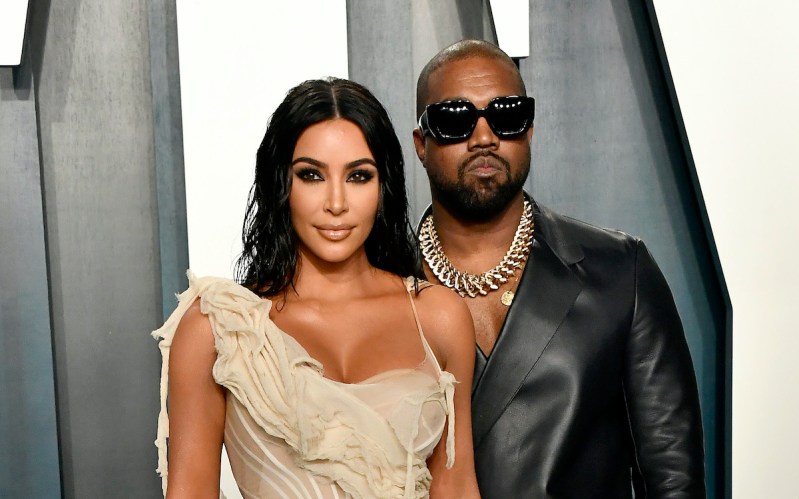 Kim Kardashian and Kanye West standing together
