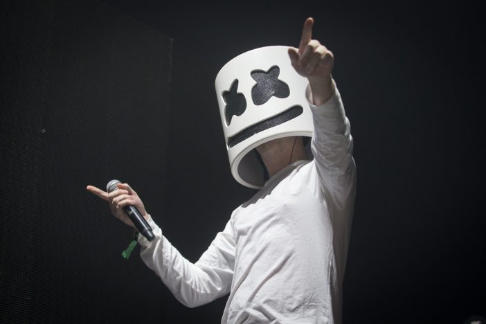 Marshmello performing on stage in his signature mask.