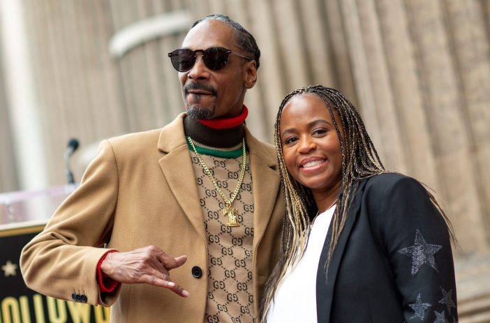 Snoop Dogg with his wife Shante Broadus at his Hollywood Walk of Fame ceremony