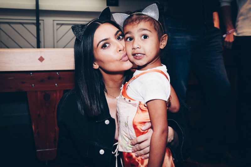 Kim Kardashian kissing North West on the cheek