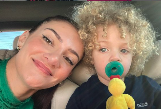 Sophie Brussaux talking a selfie with her son