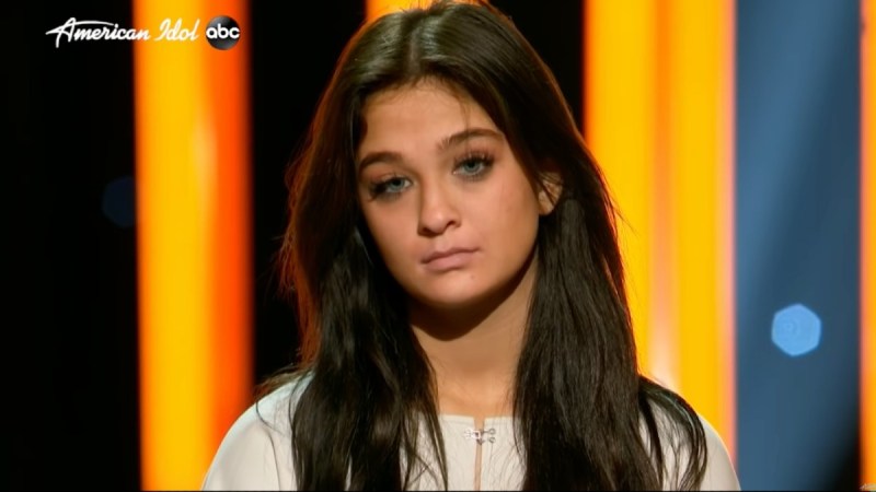 Claudia Conway stands onstage as she awaits the judges decision on American Idol