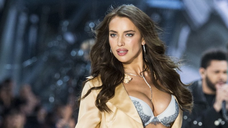 Irina Shayk walks the cat walk in lingerie and a thin pale gold robe