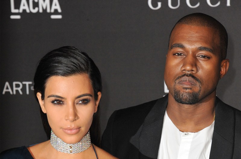 Kim Kardashian and Kanye West looking serious.