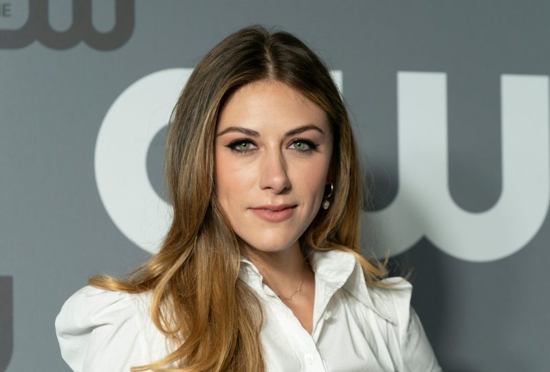 Perry Mattfeld at a CW event in 2019 wearing Carolina Herrera.