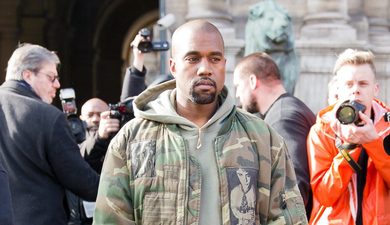 Kanye West in a camo jacket