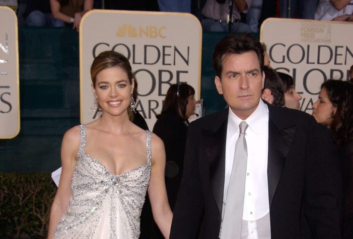 Denise Richards in a white gown and Charlie Sheen in a black suit at the 62nd Annual Golden Globe Awards.