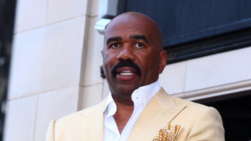 Steve Harvey wears a yellow suit as he attends his Hollywood Walk Of Fame ceremony