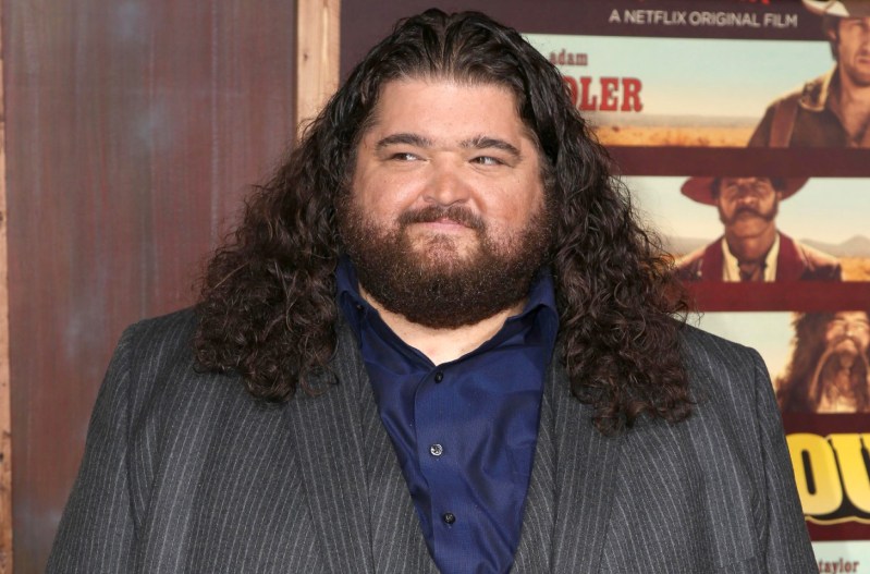 Jorge Garcia in a grey suit with a blue shirt.