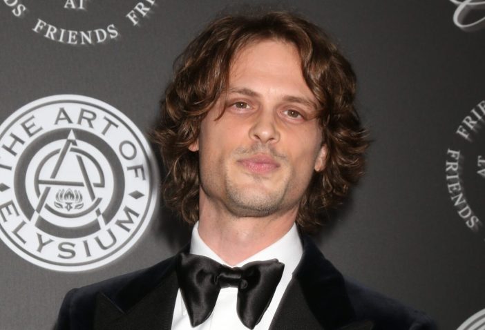 Matthew Gray Gubler with long hair and wearing a tuxedo in 2018