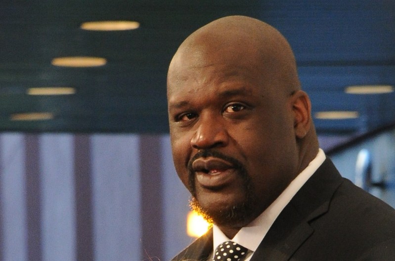 Shaq wearing a black suit.