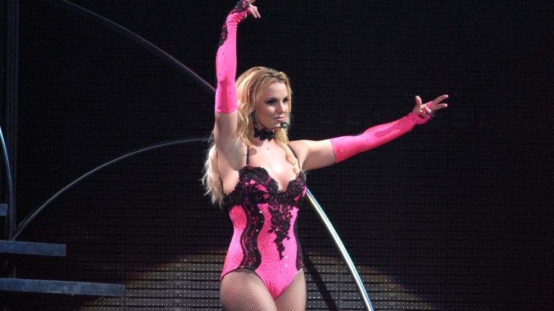 Britney Spears wears a pink leotard as she performs on stage in Rio de Janeiro, Brazil
