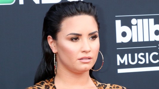 Demi Lovato wears a leopard print blazer to the Billboard Music Awards